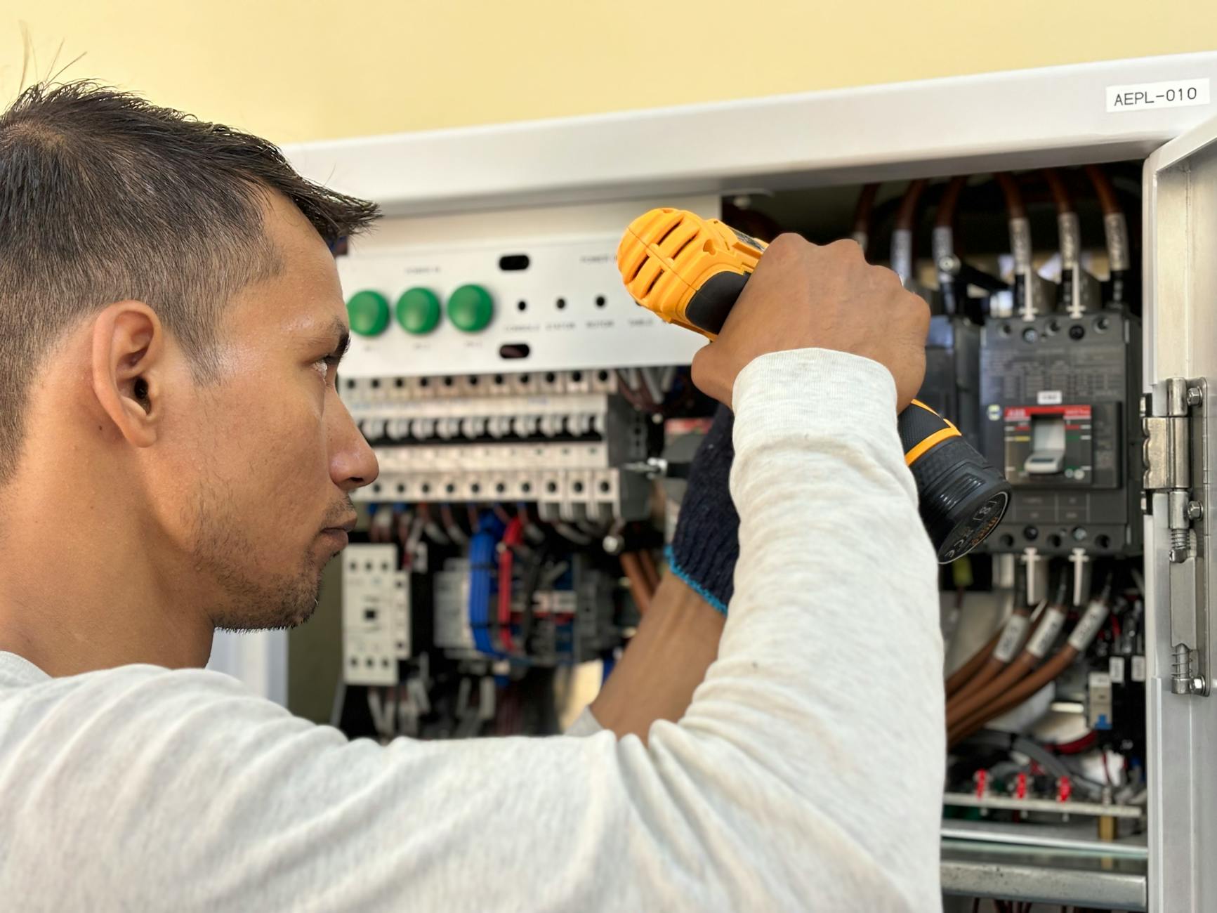 Professional electrician at work - Redwire Ltd electrical services in Auckland